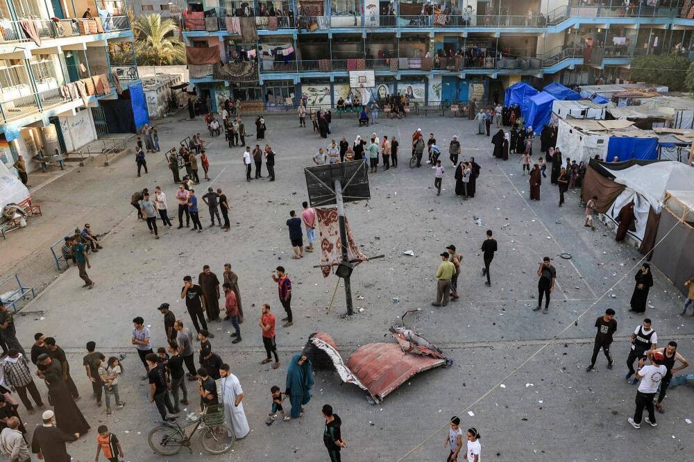 Израильский обстрел убивает 16 человек в школе в Газе, где проживают вынужденные переселенцы